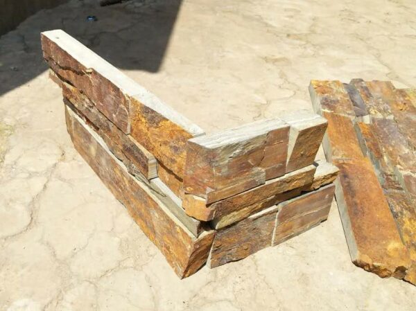 Stone cladding corner element